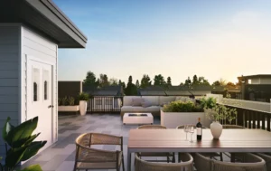 Rendering of a rooftop deck at Madison townhomes in Mission, BC, featuring dining space, lounge seating, and views designed for entertaining.